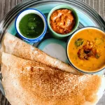 🍽️ পেল্লায় ইডলির নাম থাট্টে! টুমকুরের এই মজাদার পদ বাঙালিকেও করছে মাত