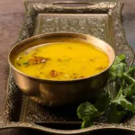 উৎসবের পর হালকা খাবার চান? আমলকি দিয়ে বানিয়ে ফেলুন টক ডাল — স্বাদে ও পুষ্টিতে ভরপুর!