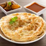 ঝুরিভাজার মুচমুচে পরোটা: সকালের নাস্তা বা বিকেলের চায়ের সঙ্গে এক অনন্য স্বাদ!